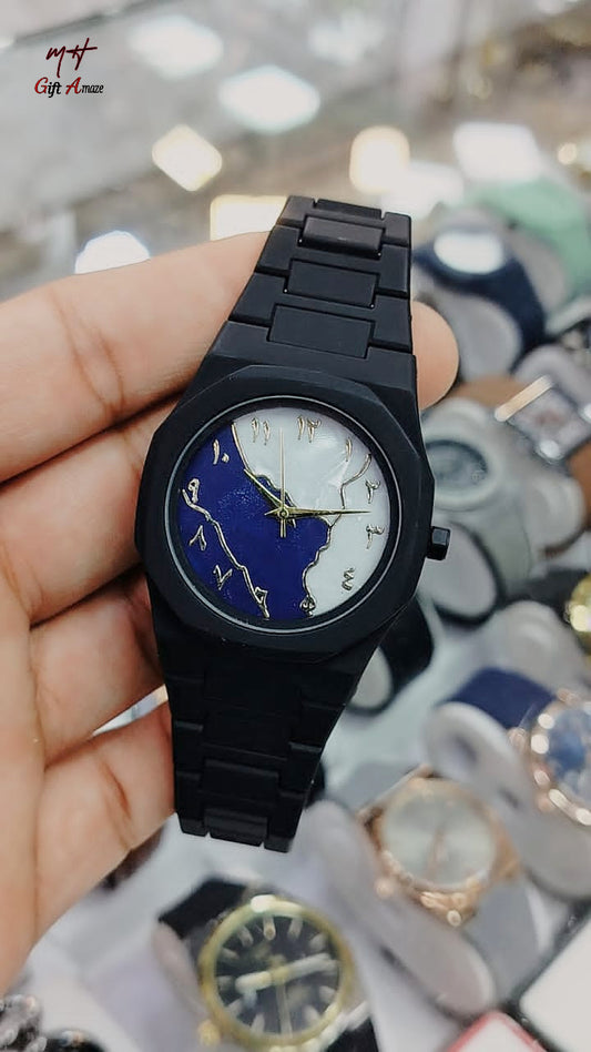 Aura — Half Day. Half Night. One Bold Watch.A minimalist wristwatch with Arabic numerals and a dramatic two-tone dial. Designed for people who don’t follow trends — they set them.
